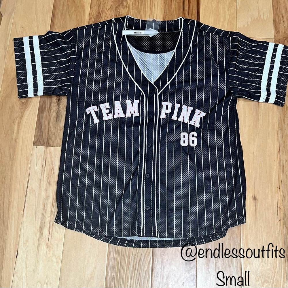 VS PINK VARSITY JERSEY BLACK AND PINK SIZE SMALL